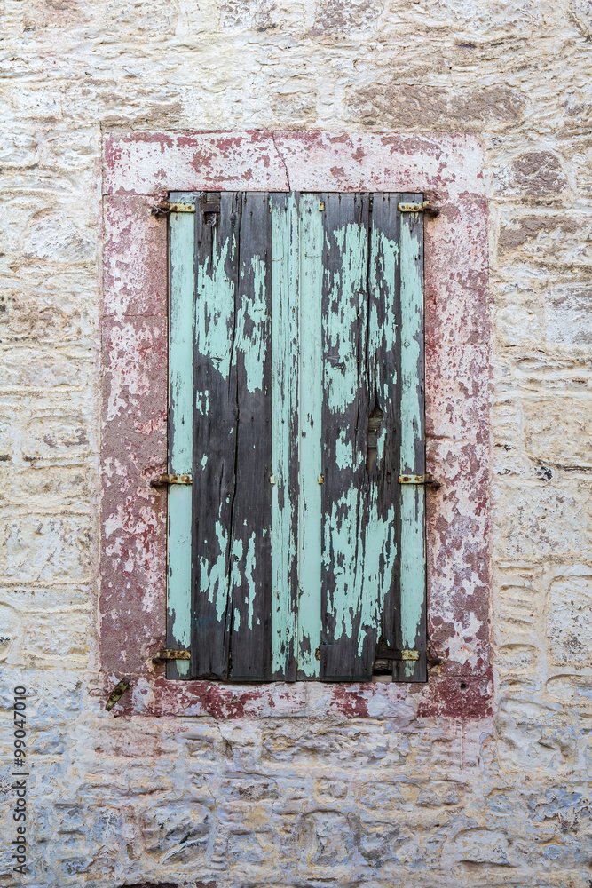 Closed windows of a traditional house in Ayvalik, Turkey Closed windows of a traditional house in Ayvalik, Turkey