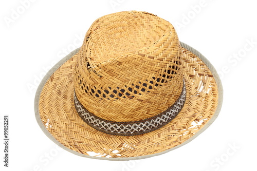 old damaged wicker hat over white
