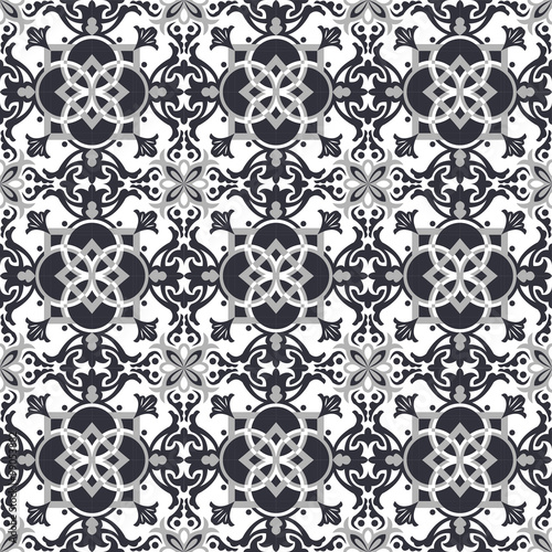 Seamless background image of vintage gray tone round square cross kaleidoscope pattern.
