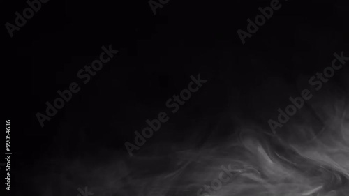 Smoke in corner of black screen, perfect for smoke detector advert.  Recorded against a black background and intended as a stand alone shot or for compositing.  Looping clip.