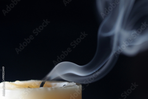 candle blow off with smoke 