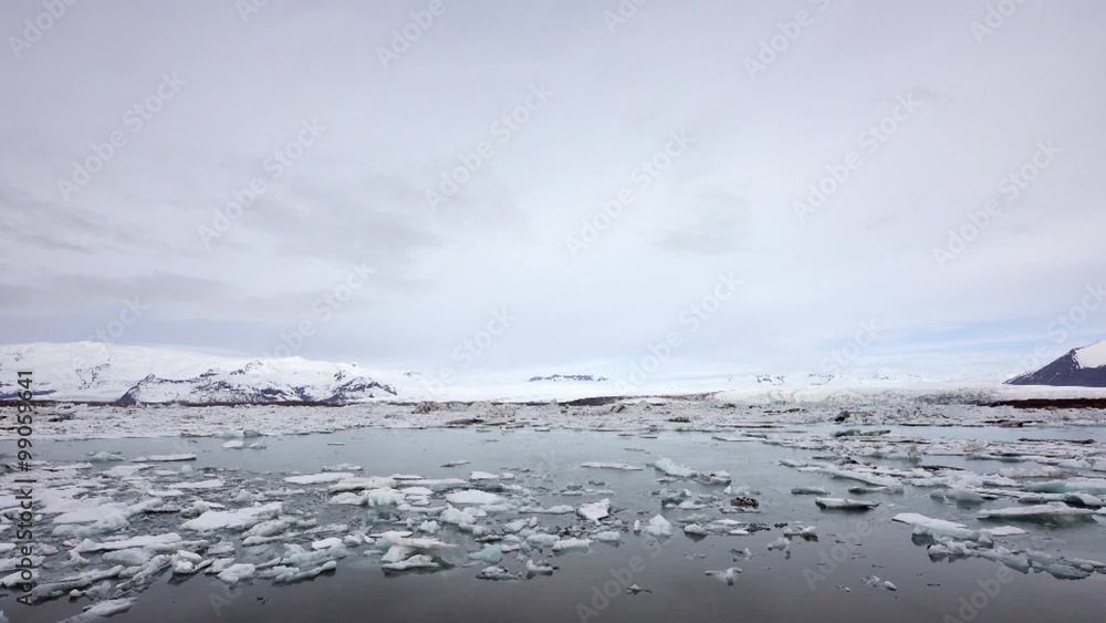Blue icebergs floating on Jokunsarlon glacial lagoon Blue icebergs floating on Jokunsarlon glacial lagoon