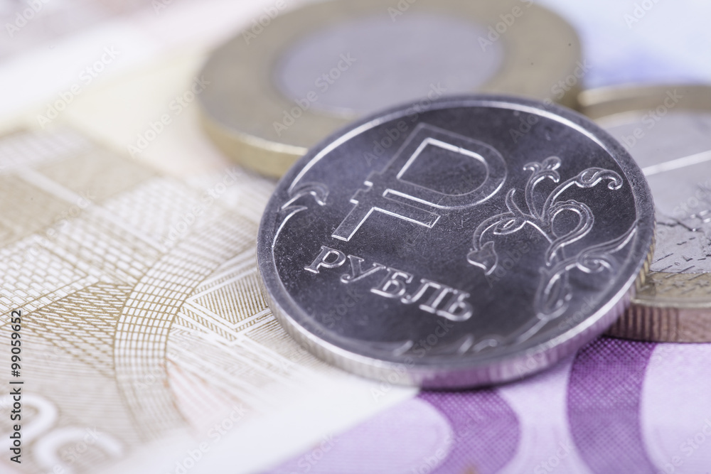 coin ruble against the background of Euro banknotes coin ruble against the background of Euro banknotes
