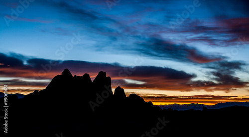rock silhouette with clouds