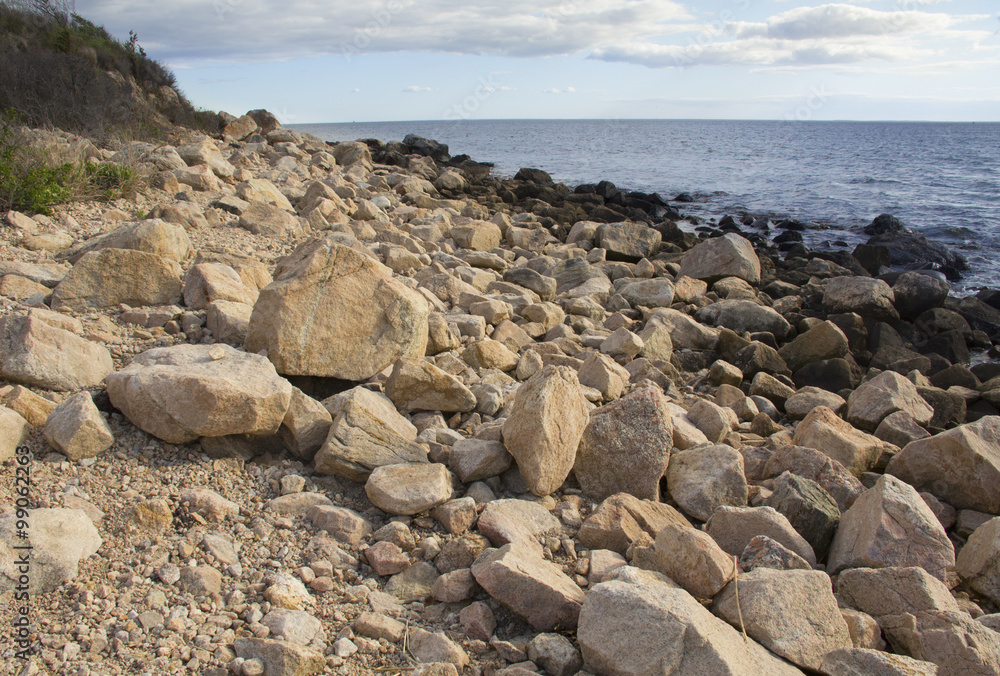 Boulders on the beach along southern coast of Connecticut on Long Island Sound.