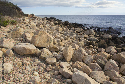 Boulders on the beach along southern coast of Connecticut on Long Island Sound. © duke2015