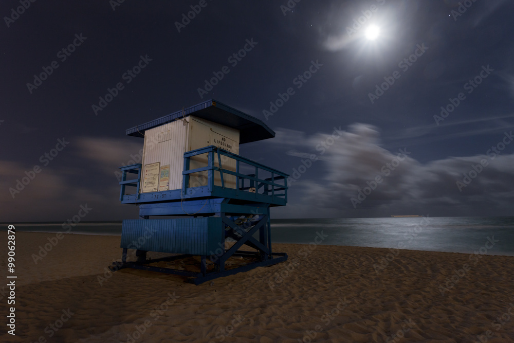 Lifeguard tower on the beach at night 