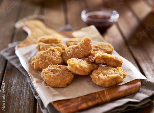 pile of crispy homemade baked chicken nuggets cooling