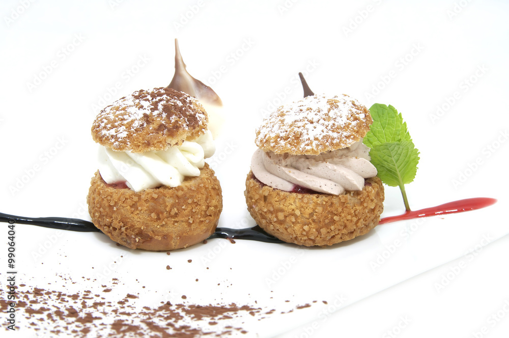 profiteroles with vanilla ice cream decorated with chocolate mint profiteroles with vanilla ice cream decorated with chocolate mint