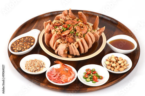 Sweet fish sauce, ground pepper, dried shrimp, peanuts, toasted coconut, sugar syrup and Santol fruit, desserts native Thailand.