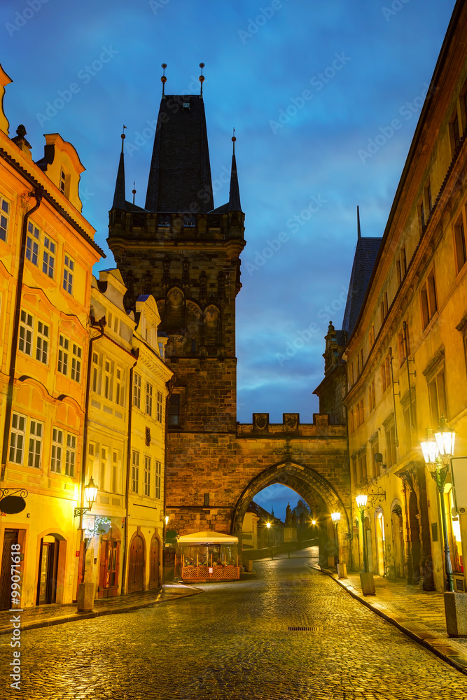 Old Prague street with Charles bridge