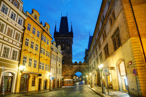 Obraz na płótnie Old Prague street with Charles bridge w salonie