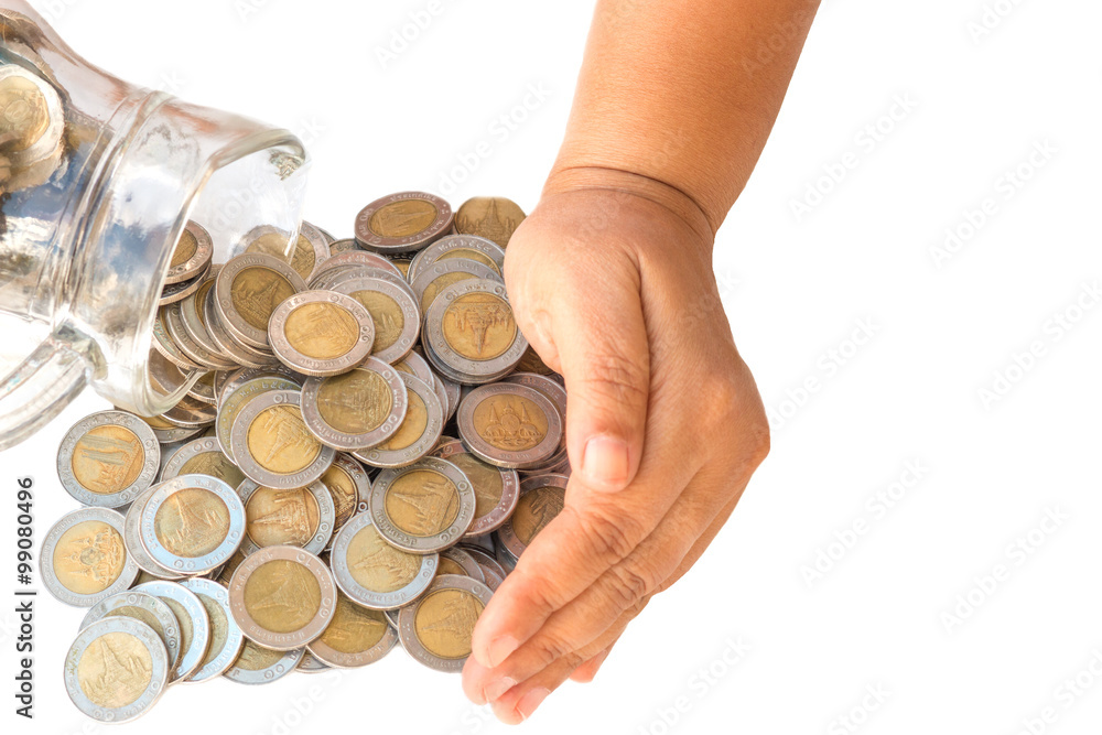 Fototapeta premium save money concept by hand put coin to money on white background