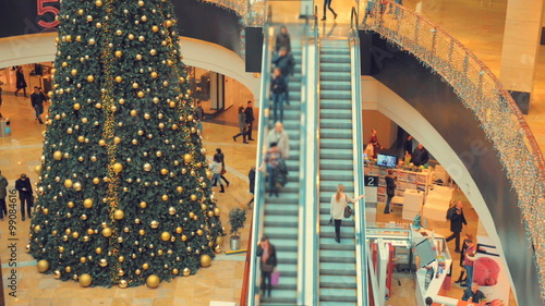 Shopping Mall Escalators Time-Lapse. People going up and down.  Christmas sale