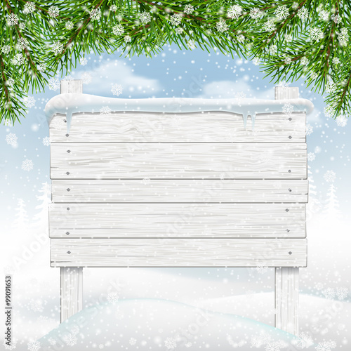 White winter wooden signboard in snow