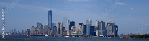 Panoramic Lower Manhattan in New York City in the background. The new World Trade Center Freedom Tower as seen   Summer 2015  