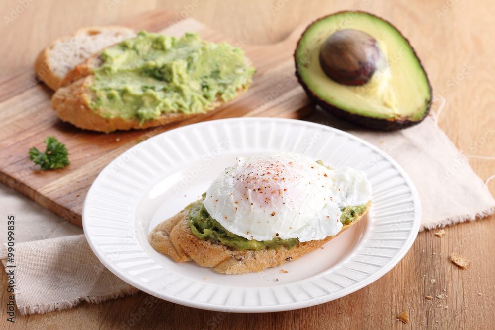 poached eggs with avocado salad . poached eggs with avocado salad .