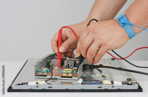 Man repairing LCD Monitor