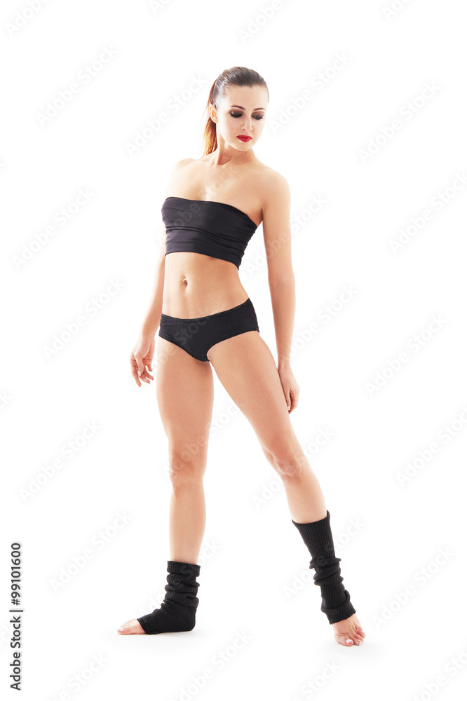 Young beautiful ballet dancer posing on a studio Young beautiful ballet dancer posing on a studio