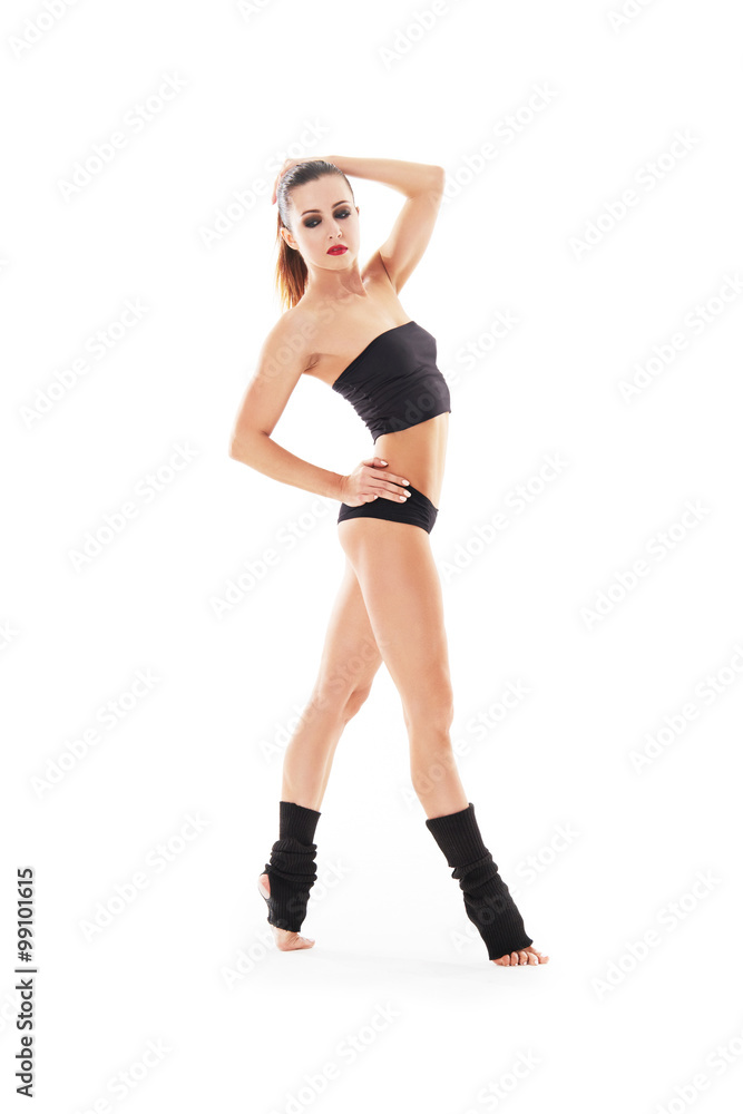 Young beautiful ballet dancer posing on a studio Young beautiful ballet dancer posing on a studio