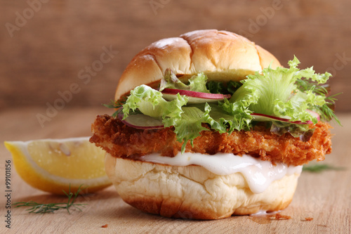 Photography crispy fish burger.