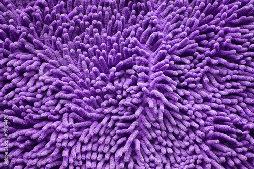 purple cleaning doormat or carpet texture