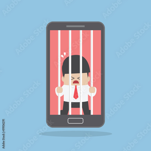 Businessman locked in smartphone
