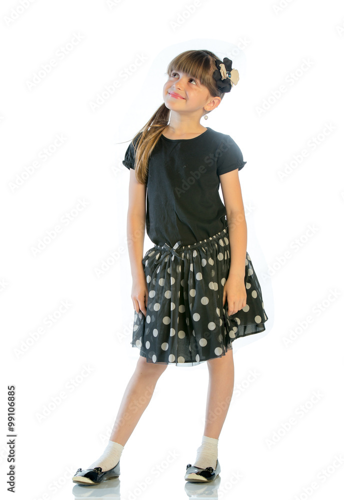Portrait of a smiling girl looking at the camera. Studio shot, isolated on white Portrait of a smiling girl looking at the camera. Studio shot, isolated on white