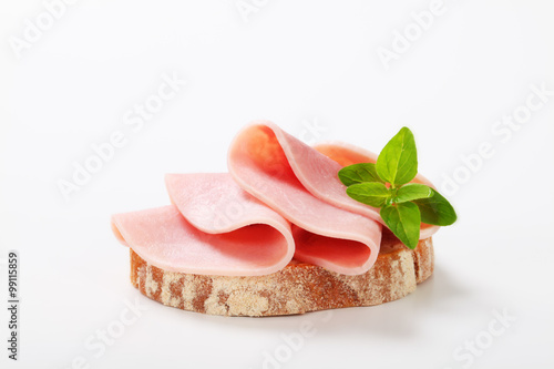 Slice of bread with ham