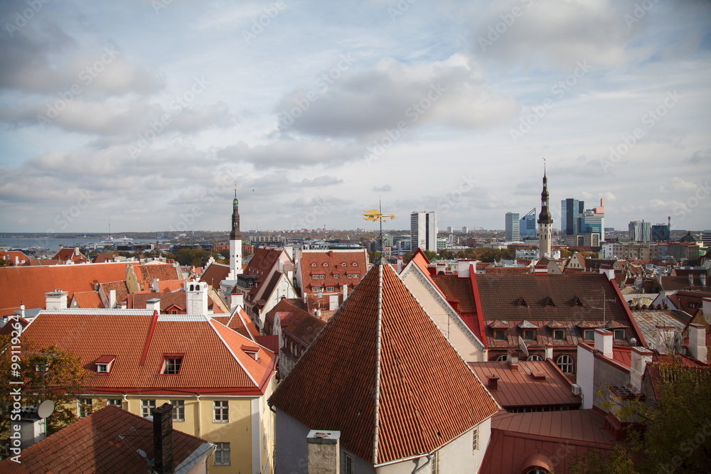 View of Tallinn from the top. Tallinn the capital of Estonia. Ancient city by the sea. The red roofs of the old historic homes. Travel and tourism. View of Tallinn from the top. Tallinn the capital of Estonia. Ancient city by the sea. The red roofs of the old historic homes. Travel and tourism.