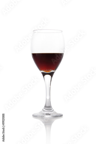 A glass of red wine isolated