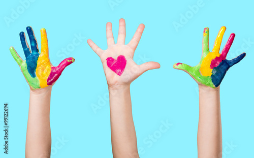 Cute little girl showing heart in valentines day.