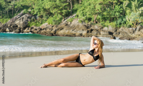 Young girl on the beach . Tropical vacation .Thailand . Phuket . Freedom beach. 