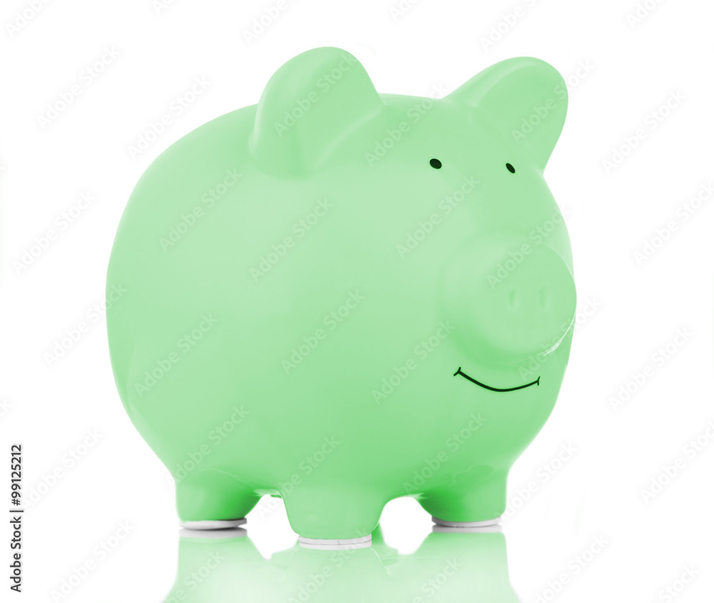 Green ceramic piggy bank isolated on white Green ceramic piggy bank isolated on white