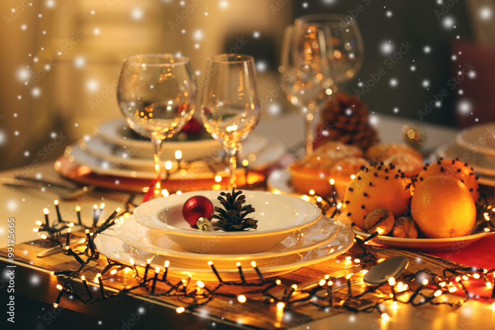 Christmas table setting with holiday decorations Christmas table setting with holiday decorations