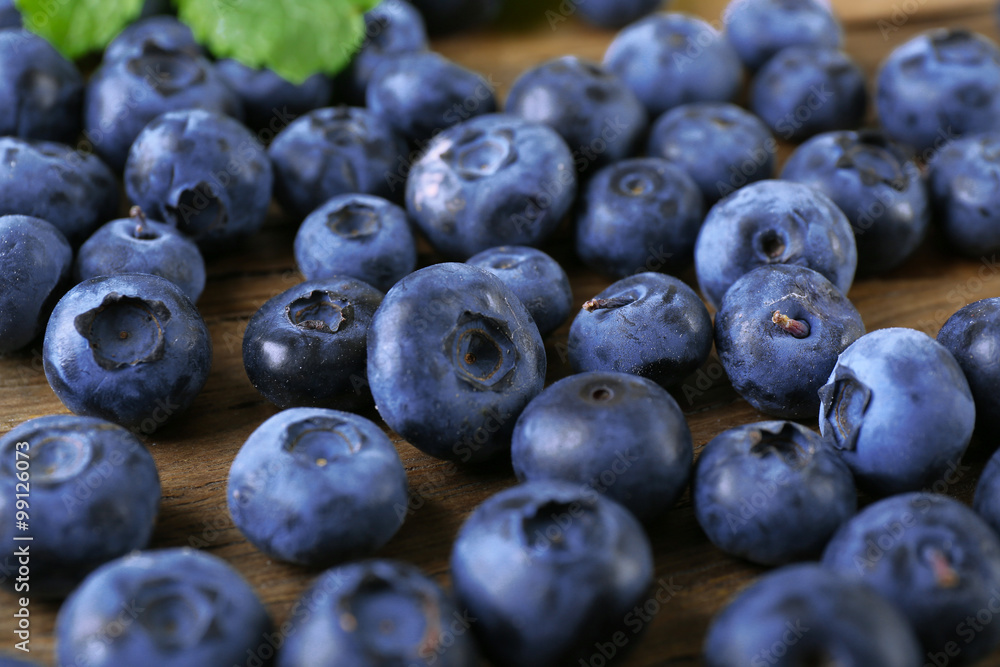 Fresh blueberries on wooden table, closeup Fresh blueberries on wooden table, closeup
