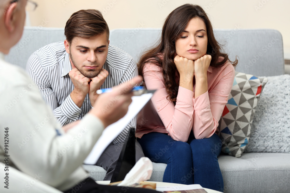 Young couple with problem on reception for family psychologist Young couple with problem on reception for family psychologist