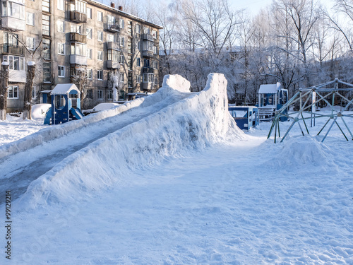 Ледяная горка во дворе photo