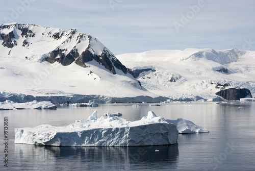 Antarctica - Wonderful Landscape With Icebergs And Blue Sky