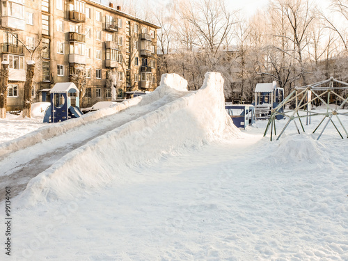 Ледяная горка во дворе photo