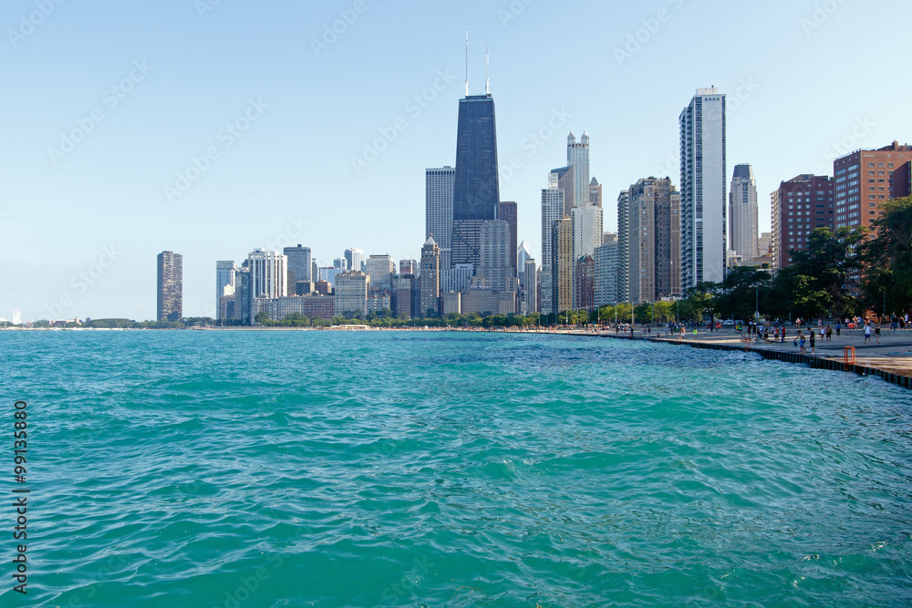 Color DSLR backlit image of Chicago city skyline as seen from beach on North Michigan Avenue