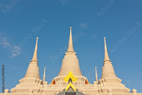Three Buddhist temple pagoda under blue sky