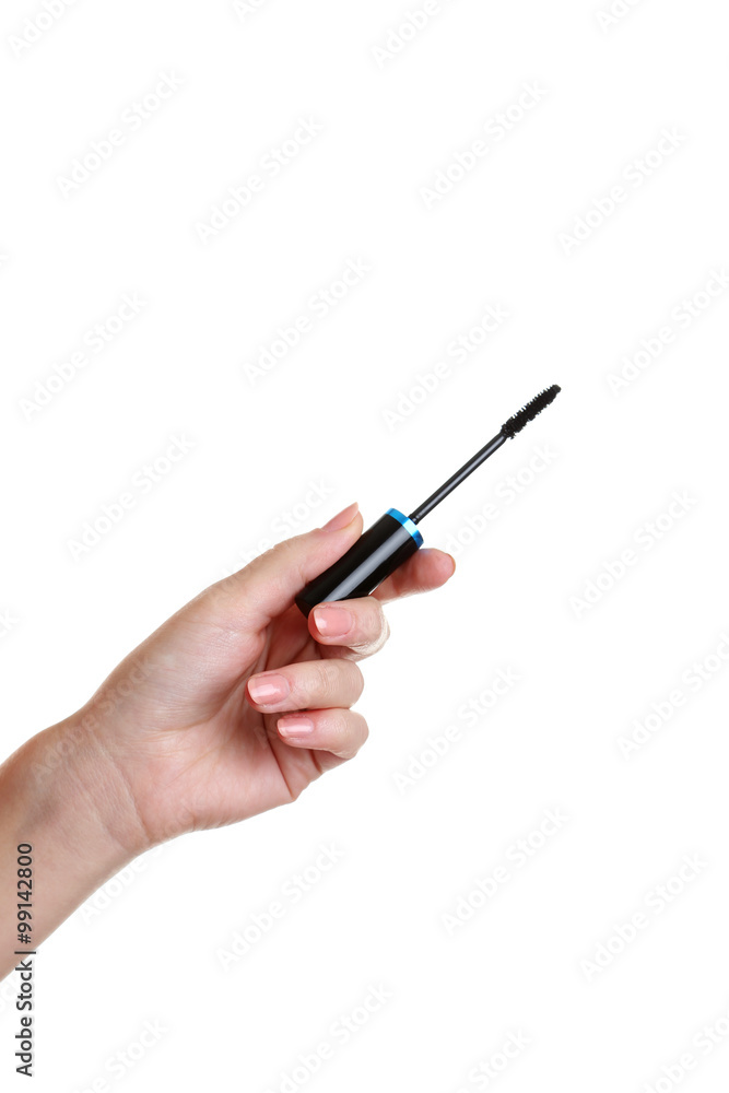 Female hand with mascara for make-up isolated on white Female hand with mascara for make-up isolated on white