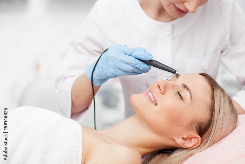 Attractive healthy woman is caring of her skin Attractive healthy woman is caring of her skin