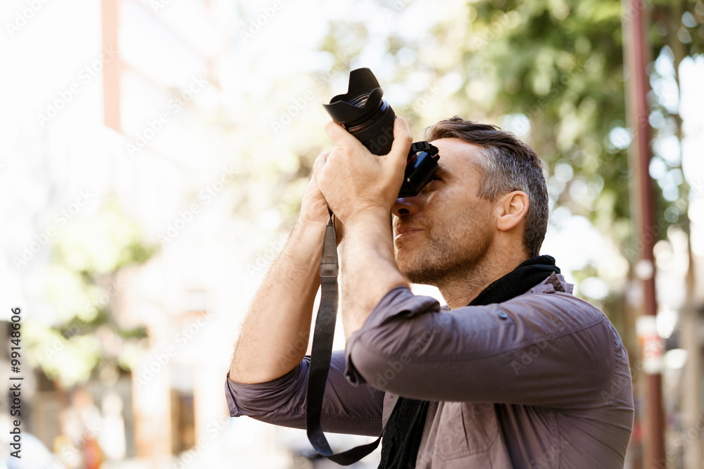 Male photographer taking picture Male photographer taking picture