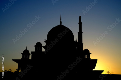 A silhouette of a mosque