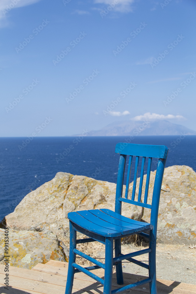 blue chair behind  landscape