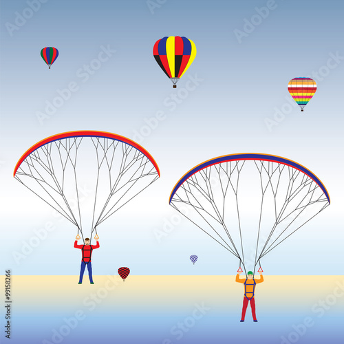 Paragliding and balloons in the sky.