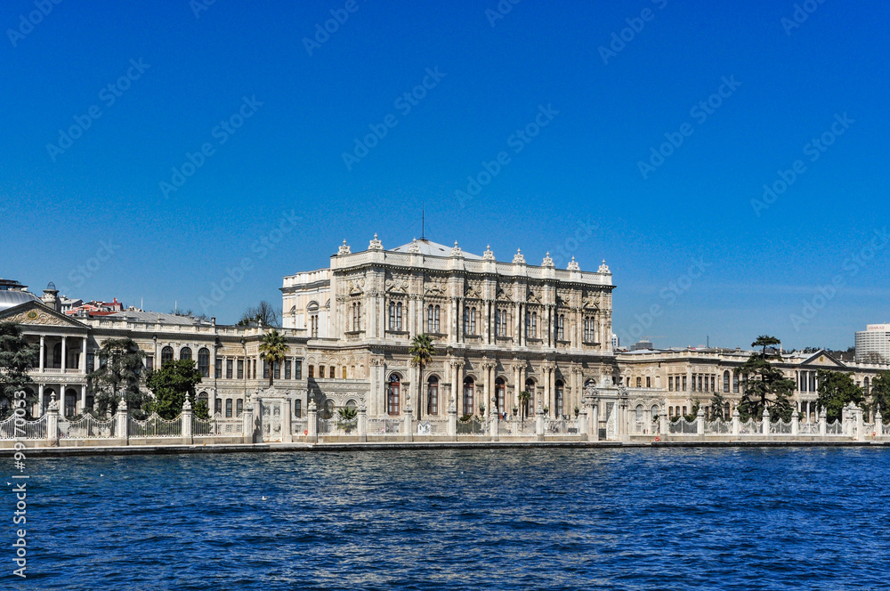 Dolmabahce palace on a sunny day, view from Bosphorus, Istanbul, Turkey