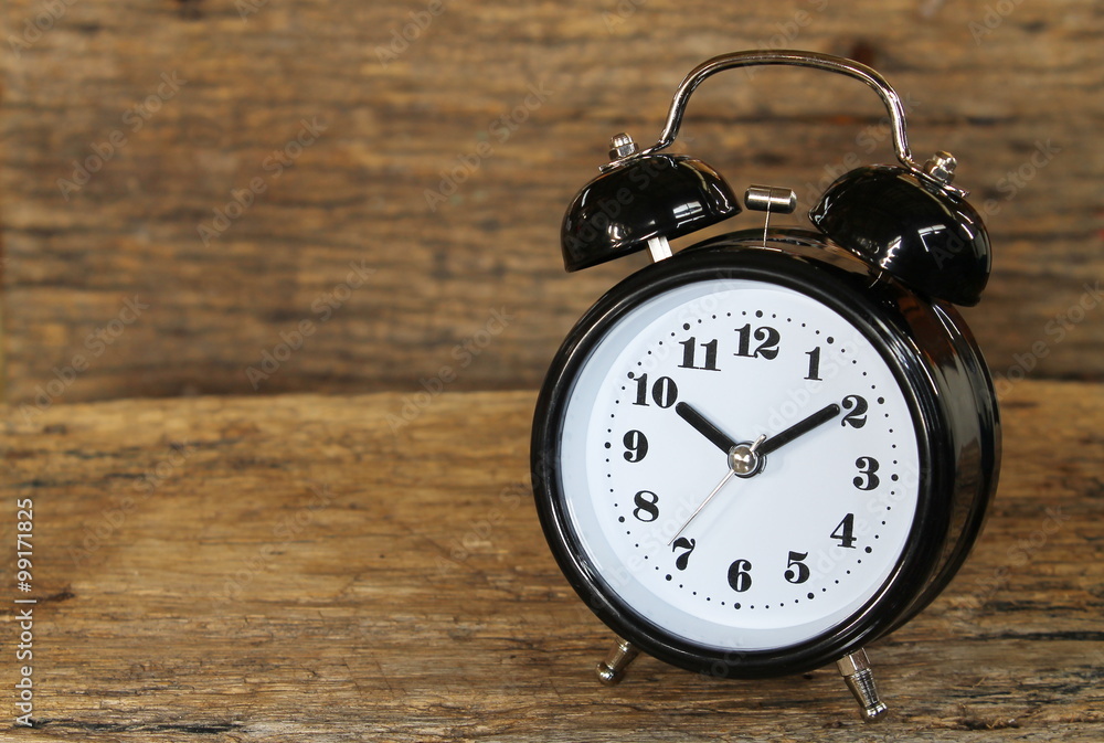 clock bell on the wood background clock bell on the wood background